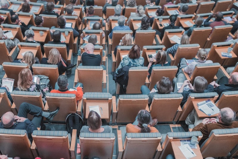 High-angle photograph of people sitting in classroom
